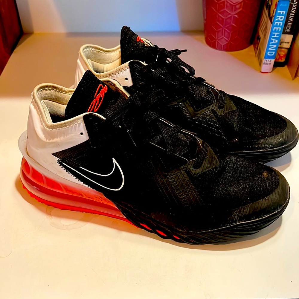 Nike LeBron 18 low basketball shoes. Red white and black.